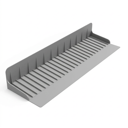 Gray silicone kitchen splash guard with ribbed base on a white background