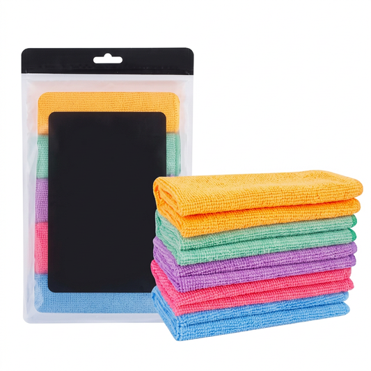 Multicolored microfiber kitchen cloths with unbranded packaging on white